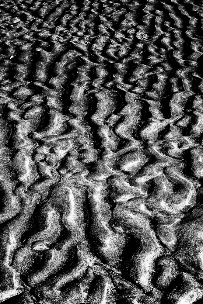 arena de playa con forma abstracta